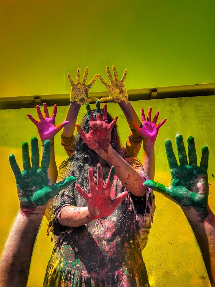 Mastering the First Impression: Your intriguing post title goes here Photo of Four People Showing Painted Hands